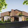 Außergewöhnlicher Lattenzaun aus Aluminium mit Schrägkappen vor einem ungewöhnlich gebauten Einfamilienhaus aus Holz